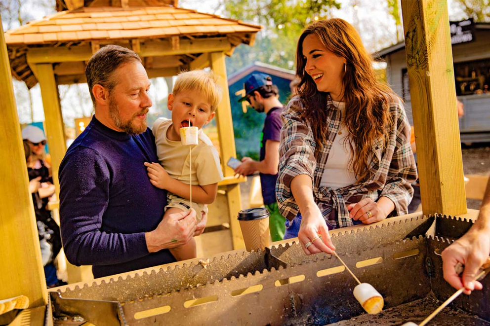 Family toasting marshmallows at Tulleys